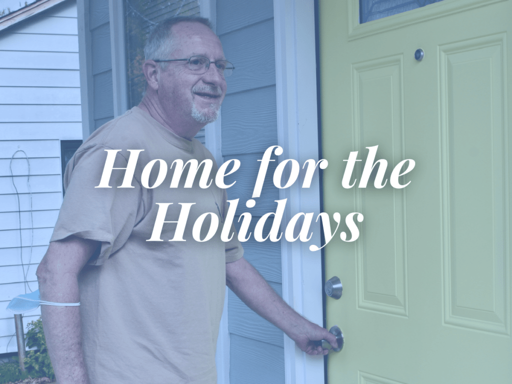 room in the inn blog title Home for the Holidays overlays image of man entering new home through a yellow door